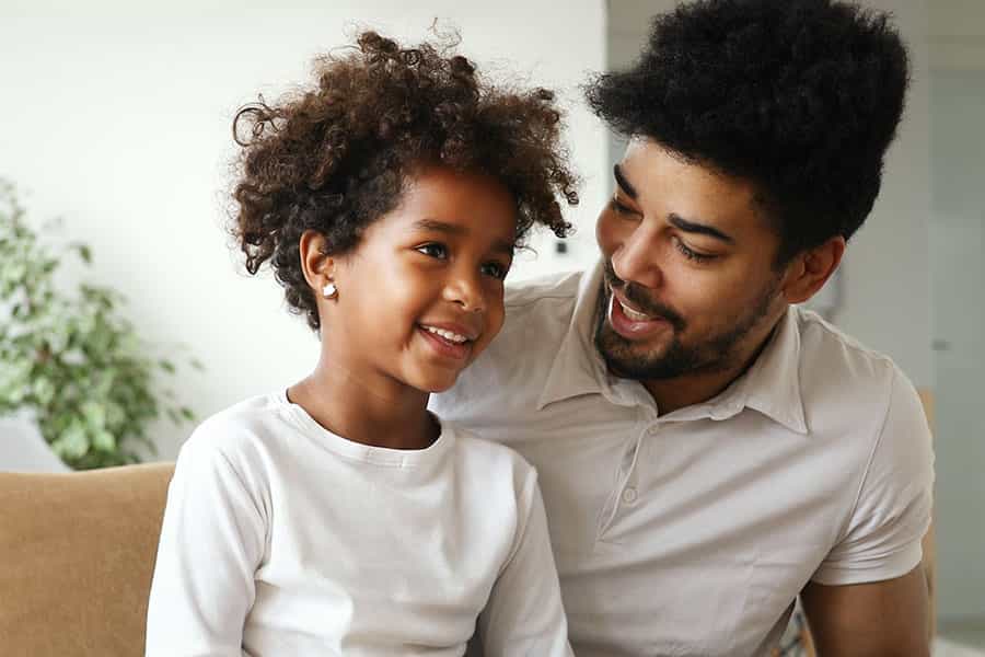 A father talking to his daughter