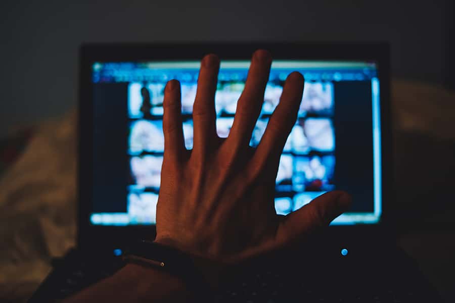 Holding a hand up to block pornographic websites