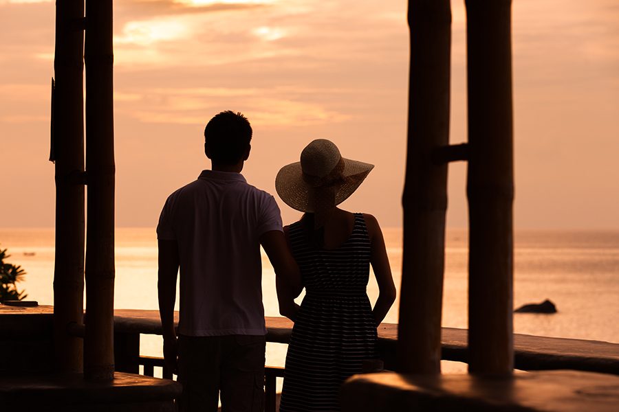 A couple enjoying a sunset