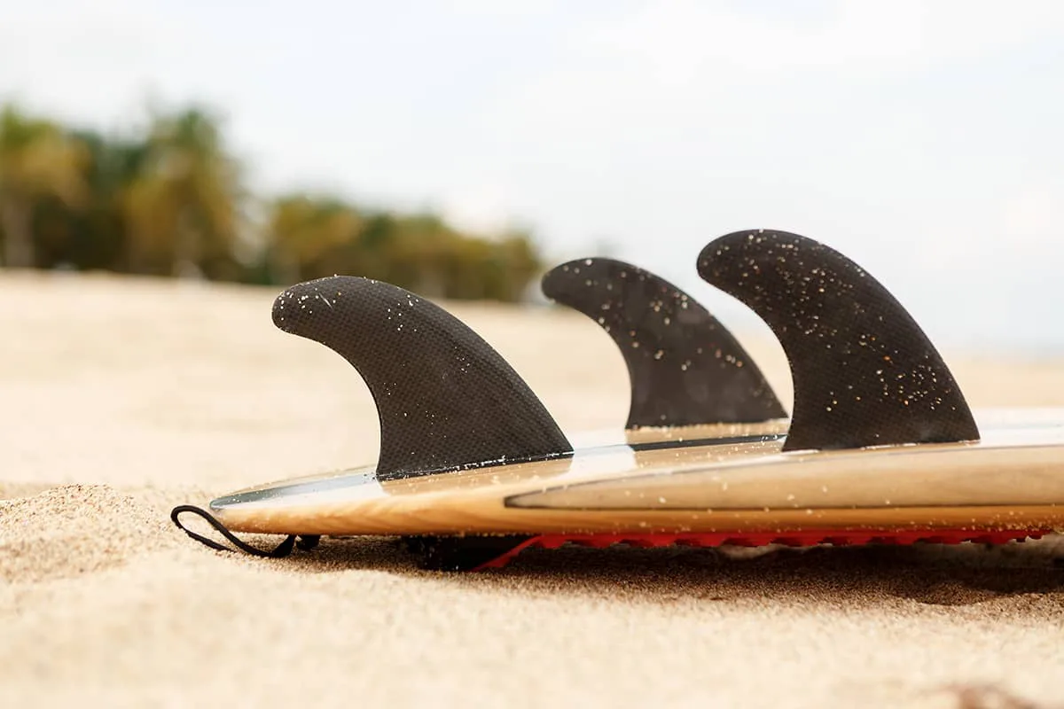A surfboard on the beach
